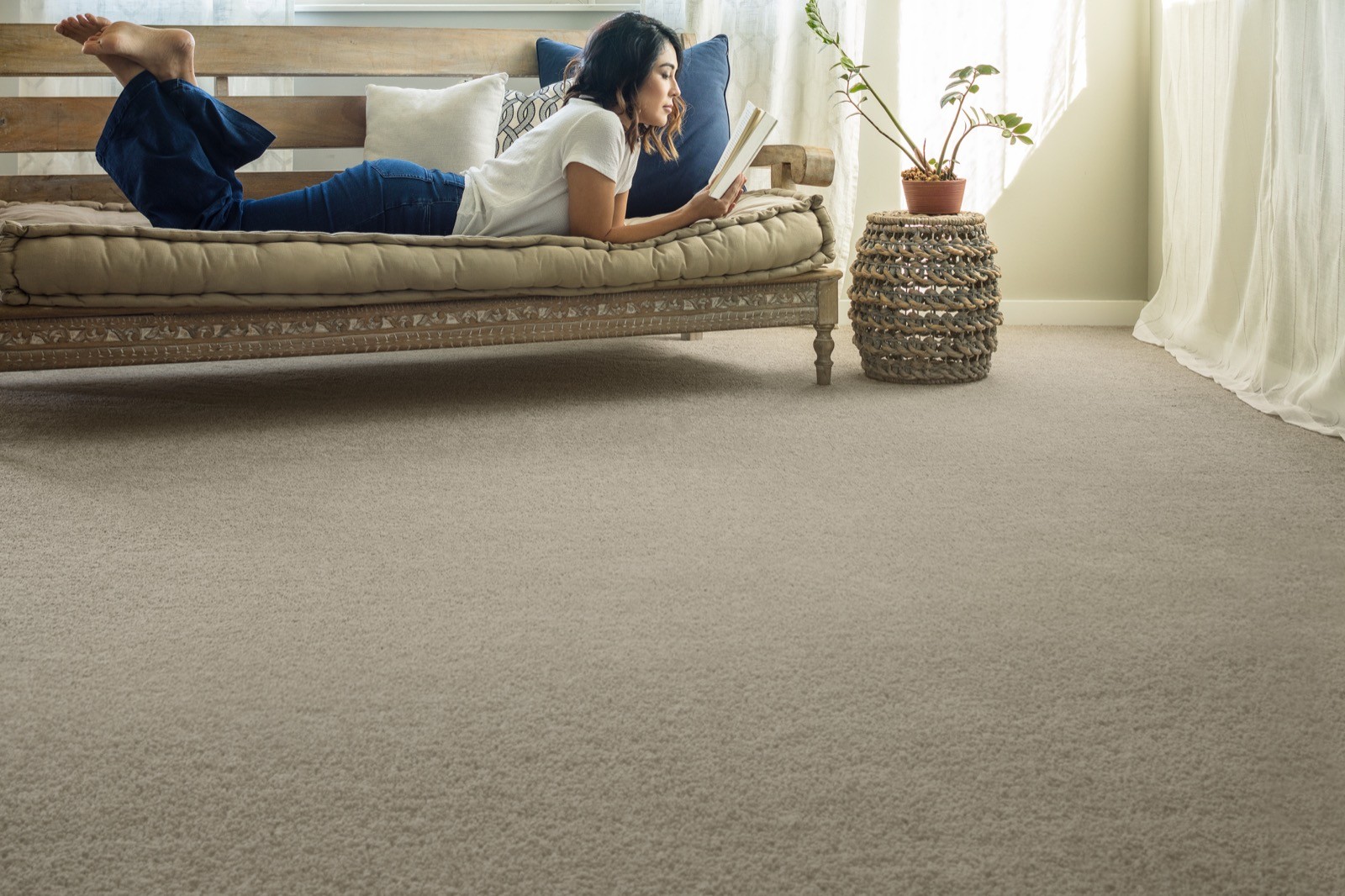 Lady reading book | West River Carpets