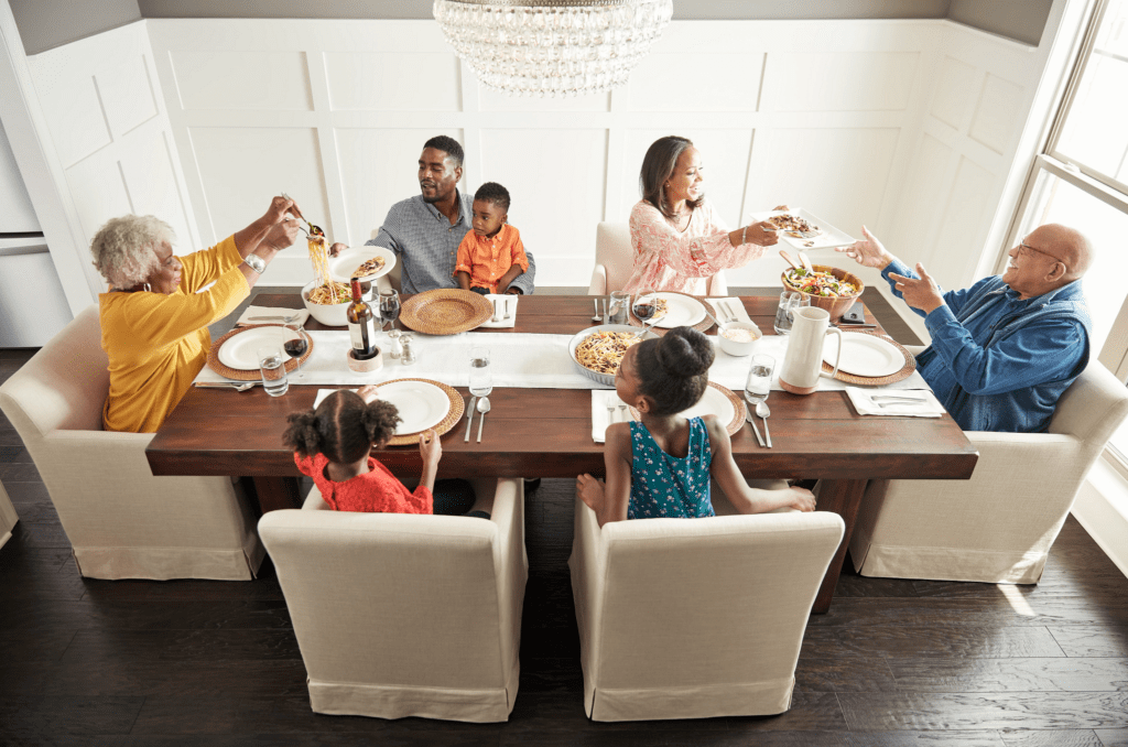 Family having breakfast at the dining table | West River Carpets